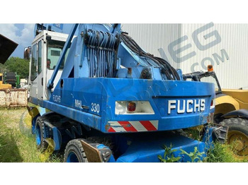 Fuchs MHL 330 - Jäätme-/ Tööstuslik käitleja