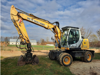 Ratastel ekskavaator NEW HOLLAND