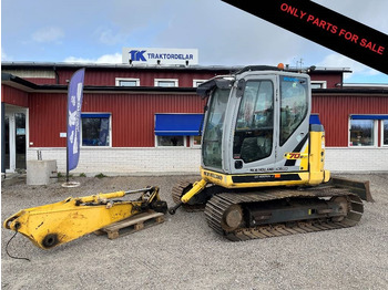 Lintekskavaator NEW HOLLAND