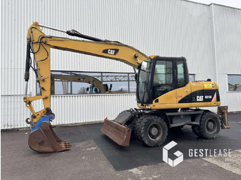 Caterpillar M313D Mono liising Caterpillar M313D Mono: pilt 1