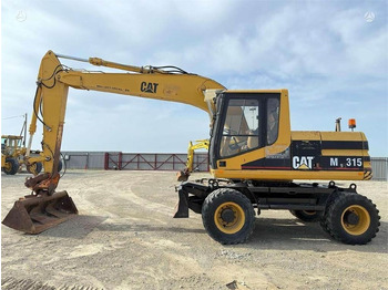 Ratastel ekskavaator CATERPILLAR M315