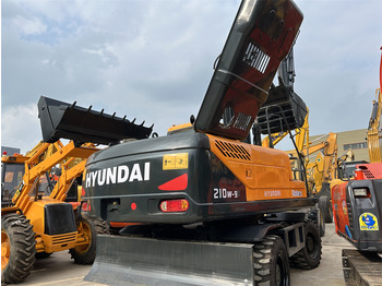 Ratastel ekskavaator HYUNDAI 210W-9: pilt 2