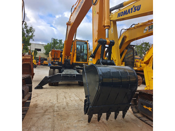 Ratastel ekskavaator HYUNDAI 210W-9: pilt 5
