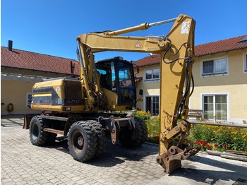 Ratastel ekskavaator CATERPILLAR M312