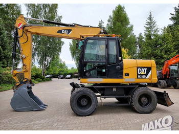 Ratastel ekskavaator CATERPILLAR M313D