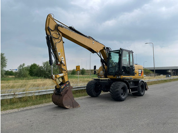 Ratastel ekskavaator Caterpillar M313D - CE: pilt 3