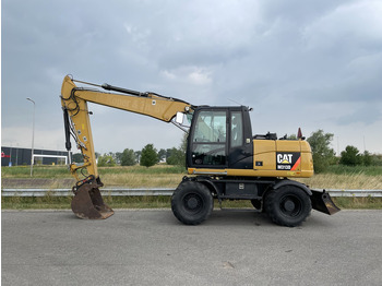 Ratastel ekskavaator Caterpillar M313D - CE: pilt 2