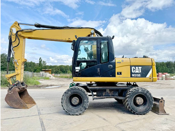 Ratastel ekskavaator CATERPILLAR M315D
