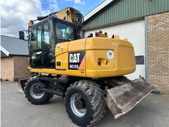 Ratastel ekskavaator Caterpillar M313D: pilt 3