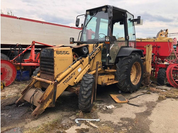 Ekskavaator-laadur NEW HOLLAND