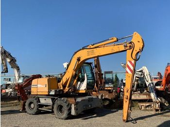 Ratastel ekskavaator Liebherr A 312: pilt 5