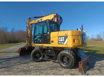 Ratastel ekskavaator CATERPILLAR M313D
