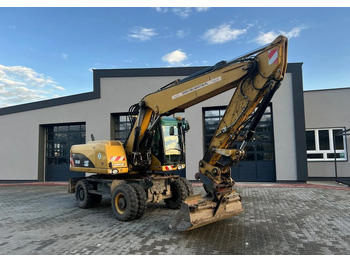 Ratastel ekskavaator CATERPILLAR M318D