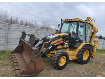 Ekskavaator-laadur CATERPILLAR