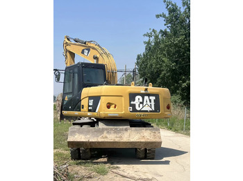 Ratastel ekskavaator CATERPILLAR M317D2: pilt 2