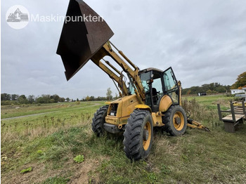 Ekskavaator-laadur NEW HOLLAND