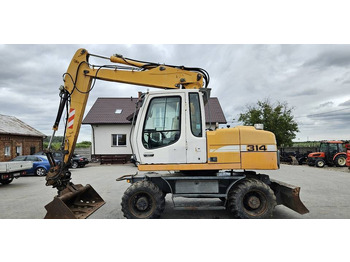 Ratastel ekskavaator LIEBHERR A 314