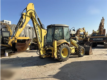 Ekskavaator-laadur NEW HOLLAND