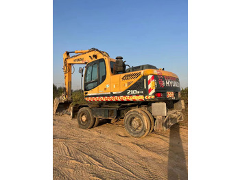 Ratastel ekskavaator HYUNDAI R210W-9: pilt 2