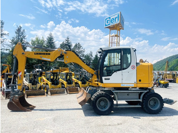 Ratastel ekskavaator LIEBHERR A 910