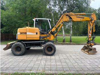 Ratastel ekskavaator LIEBHERR A 309 Litronic: pilt 2