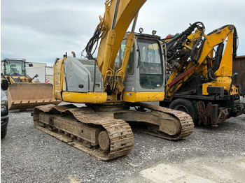 Lintekskavaator NEW HOLLAND
