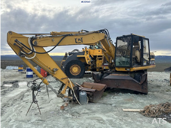 Ratastel ekskavaator CATERPILLAR 312