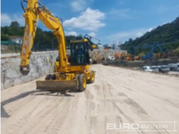 Ratastel ekskavaator KOMATSU