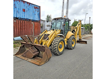 Ekskavaator-laadur NEW HOLLAND