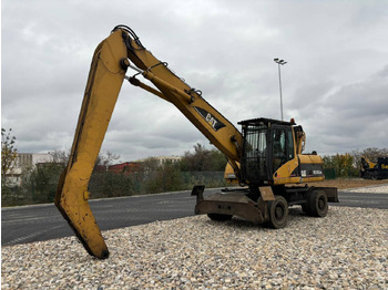 Ratastel ekskavaator CATERPILLAR M318