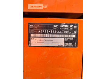 Ratastel ekskavaator CATERPILLAR M318