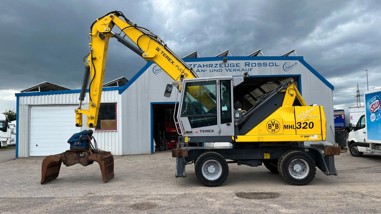 Fuchs TeRex MHL 320 D Umschlagbagger Greifer Pratzen - Jäätme-/ Tööstuslik käitleja: pilt 1 Fuchs TeRex MHL 320 D Umschlagbagger Greifer Pratzen - Jäätme-/ Tööstuslik käitleja: pilt 1