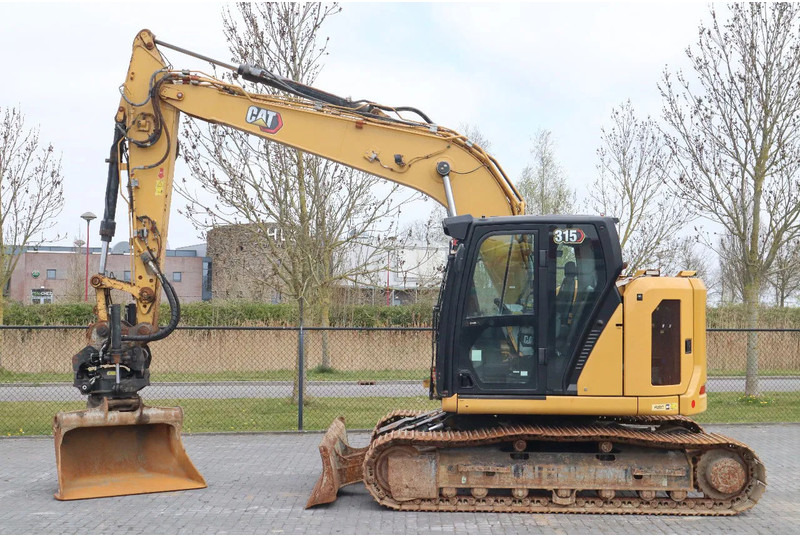 Caterpillar 315 07B | ROTOTILT | BUCKET | DOZERBLADE - Lintekskavaator: pilt 1 Caterpillar 315 07B | ROTOTILT | BUCKET | DOZERBLADE - Lintekskavaator: pilt 1