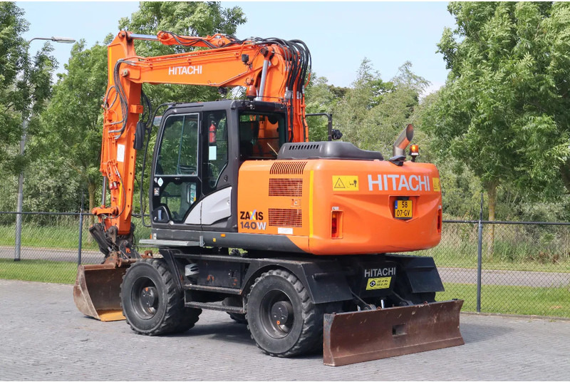 Hitachi ZX 140 W-5B | TILT QC | BUCKET | DOZER BLADE | DUTCH REG. - Ratastel ekskavaator: pilt 3 Hitachi ZX 140 W-5B | TILT QC | BUCKET | DOZER BLADE | DUTCH REG. - Ratastel ekskavaator: pilt 3