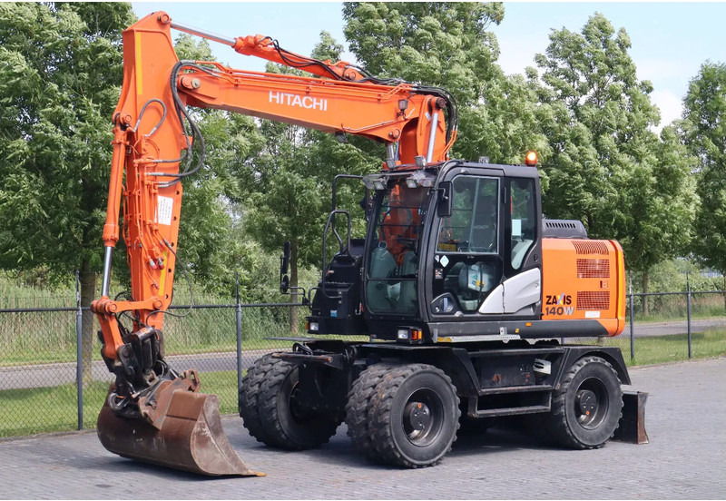 Hitachi ZX 140 W-5B | TILT QC | BUCKET | DOZER BLADE | DUTCH REG. - Ratastel ekskavaator: pilt 2 Hitachi ZX 140 W-5B | TILT QC | BUCKET | DOZER BLADE | DUTCH REG. - Ratastel ekskavaator: pilt 2