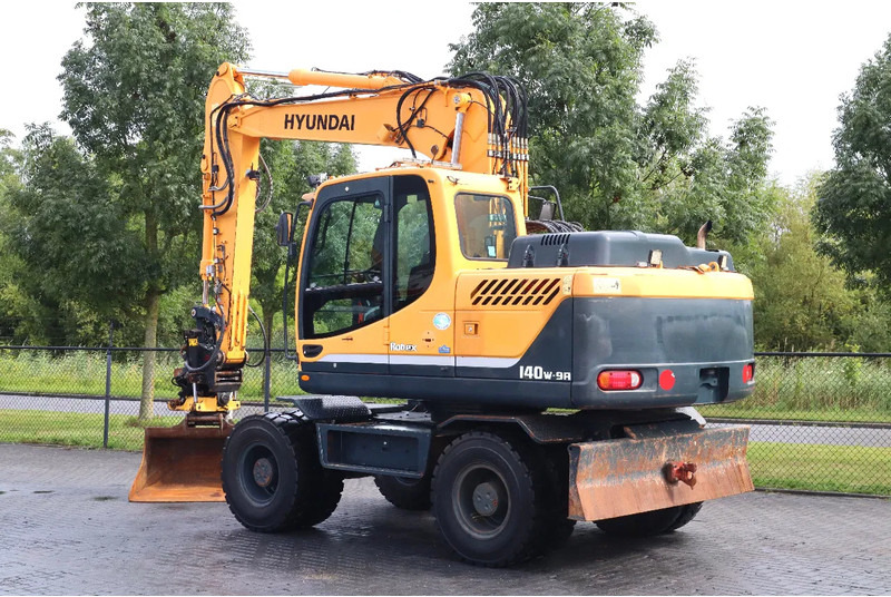 Hyundai ROBEX 140W-9A | ROTOTILT | BUCKET | ONLY 3502 HOUR! | GOOD TIRES - Ratastel ekskavaator: pilt 3 Hyundai ROBEX 140W-9A | ROTOTILT | BUCKET | ONLY 3502 HOUR! | GOOD TIRES - Ratastel ekskavaator: pilt 3