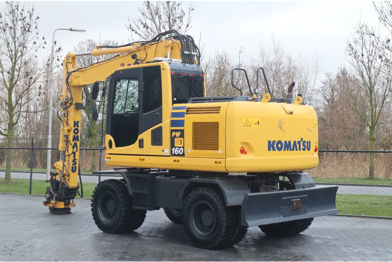 Komatsu PW 160-10 | ROTOTILT | NEW TIRES - Ratastel ekskavaator: pilt 3 Komatsu PW 160-10 | ROTOTILT | NEW TIRES - Ratastel ekskavaator: pilt 3