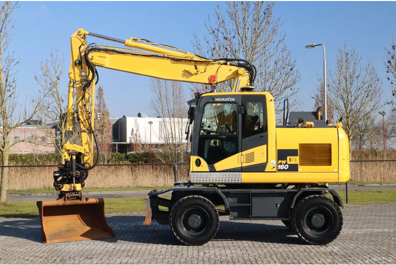 Komatsu PW160-11 | ENGCON TILTROTATOR | BUCKET | TRAILER HYDR. - Ratastel ekskavaator: pilt 1 Komatsu PW160-11 | ENGCON TILTROTATOR | BUCKET | TRAILER HYDR. - Ratastel ekskavaator: pilt 1