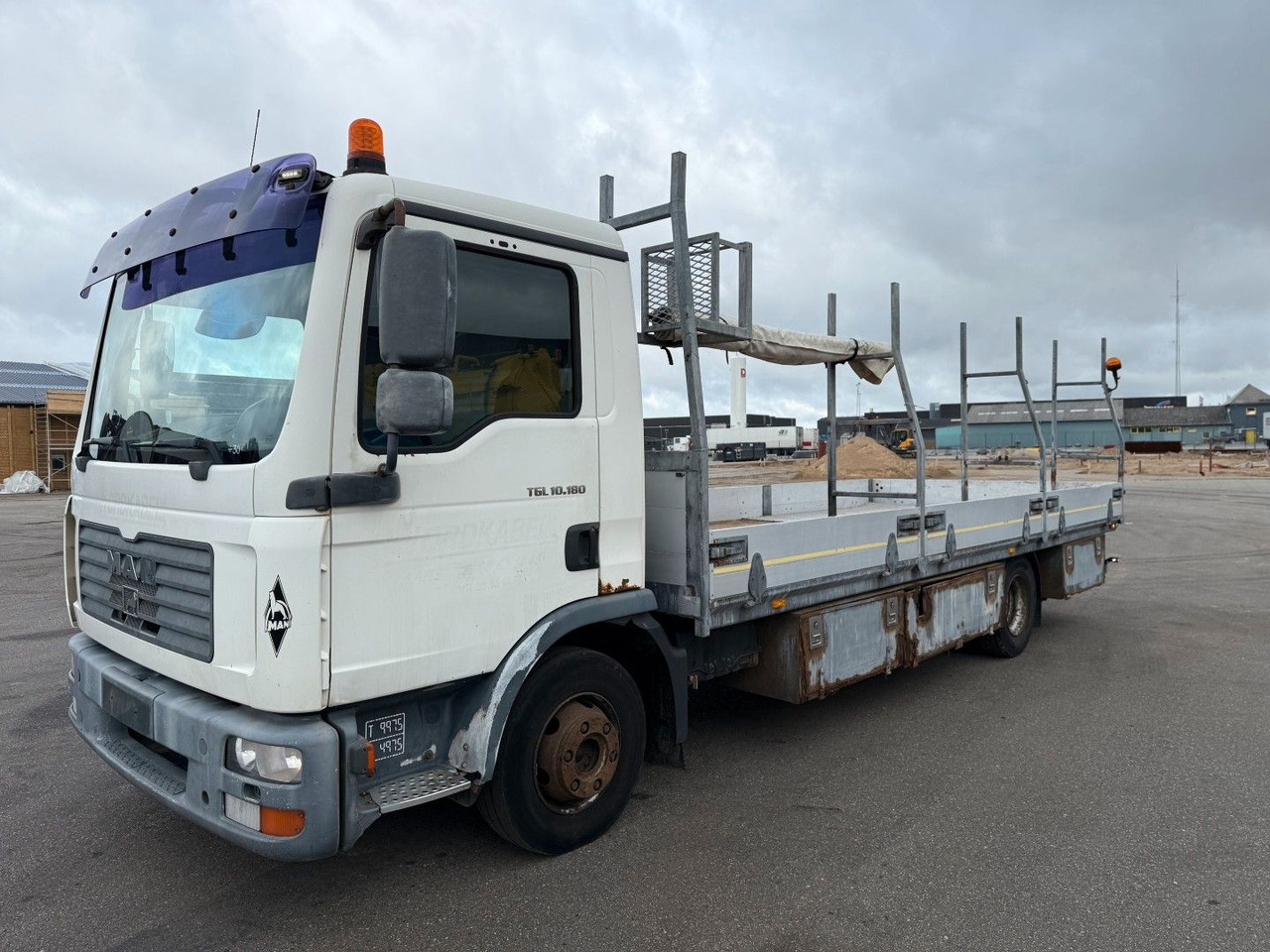 MAN TGL 10.180 4x2 Flatbed 6,,80 m. Euro 3 - Madelveok/ Platvormveok: pilt 1 MAN TGL 10.180 4x2 Flatbed 6,,80 m. Euro 3 - Madelveok/ Platvormveok: pilt 1
