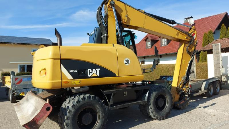 Caterpillar M313D VAH - Ratastel ekskavaator: pilt 2 Caterpillar M313D VAH - Ratastel ekskavaator: pilt 2