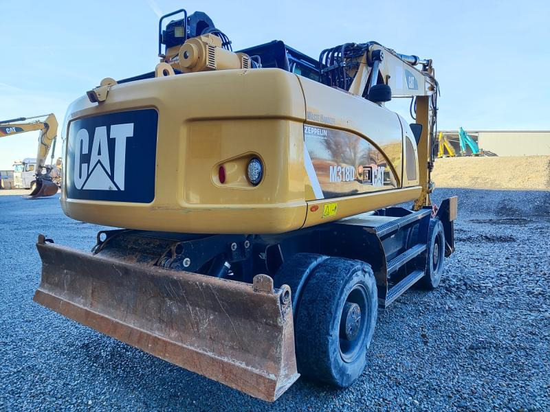 Caterpillar M318D MH - Ratastel ekskavaator: pilt 1 Caterpillar M318D MH - Ratastel ekskavaator: pilt 1