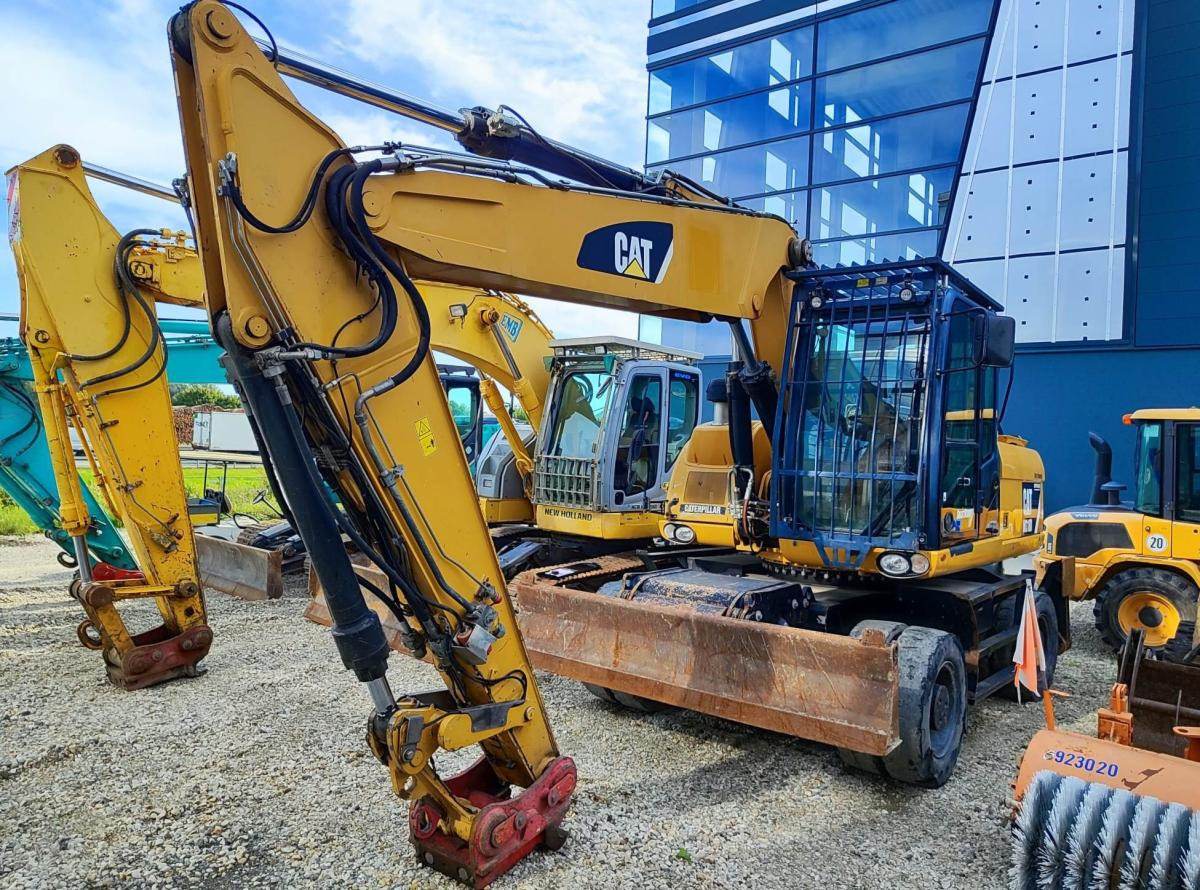 Caterpillar M318D MH - Ratastel ekskavaator: pilt 2 Caterpillar M318D MH - Ratastel ekskavaator: pilt 2