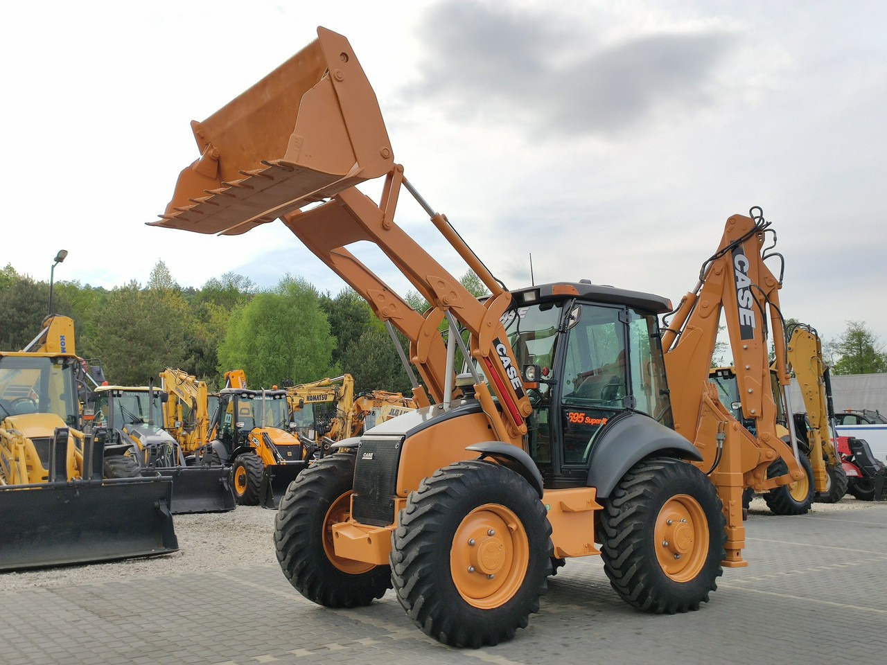 Case 695SR2-4PS - Ekskavaator-laadur: pilt 1 Case 695SR2-4PS - Ekskavaator-laadur: pilt 1