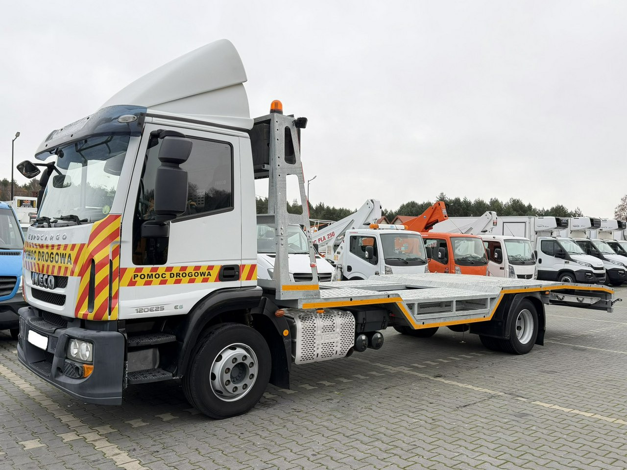 Iveco EUROCARGO 120E25 E6 Laweta Zagłebiana Platforma Pomoc Drogowa - Puksiirauto: pilt 1 Iveco EUROCARGO 120E25 E6 Laweta Zagłebiana Platforma Pomoc Drogowa - Puksiirauto: pilt 1
