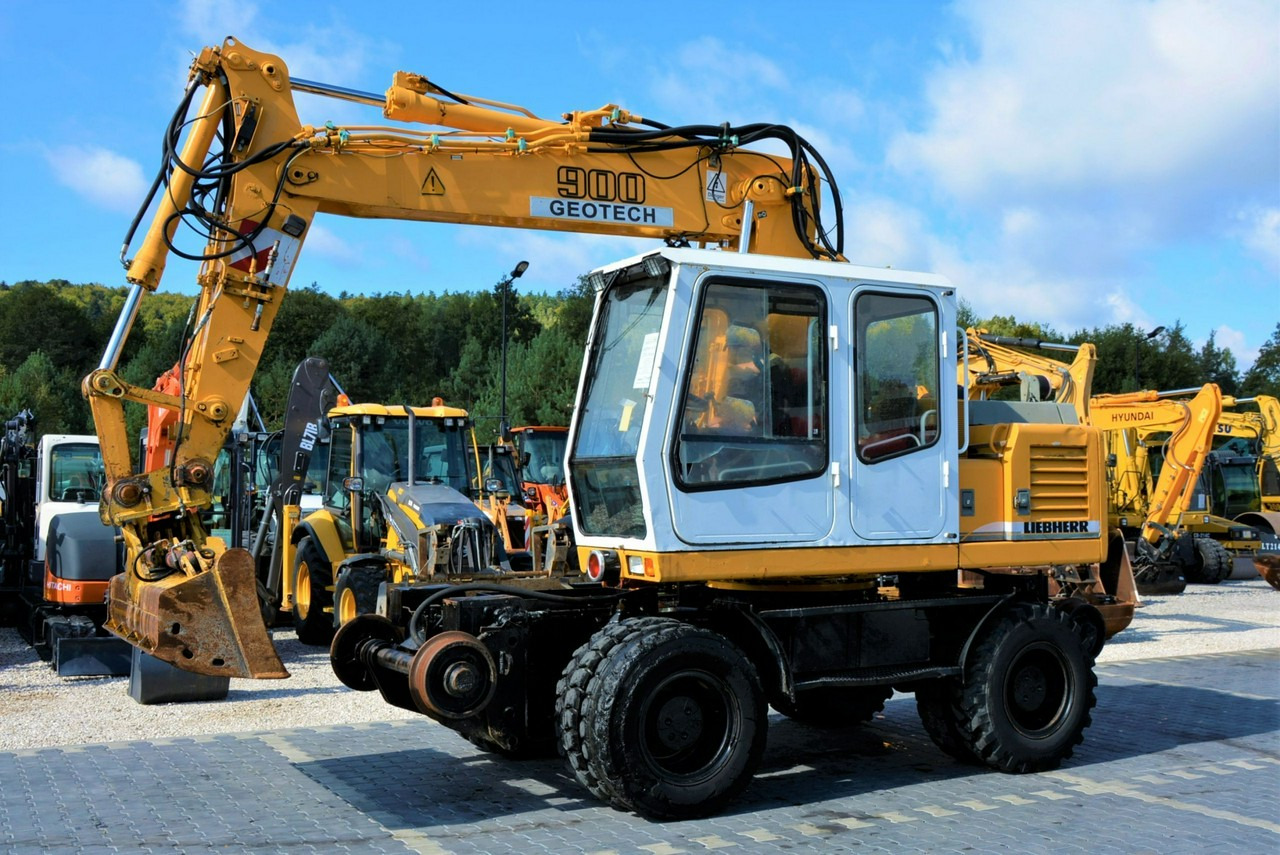 Liebherr A 900 ZW Litronic Koparka + Kolej - Ratastel ekskavaator: pilt 1 Liebherr A 900 ZW Litronic Koparka + Kolej - Ratastel ekskavaator: pilt 1