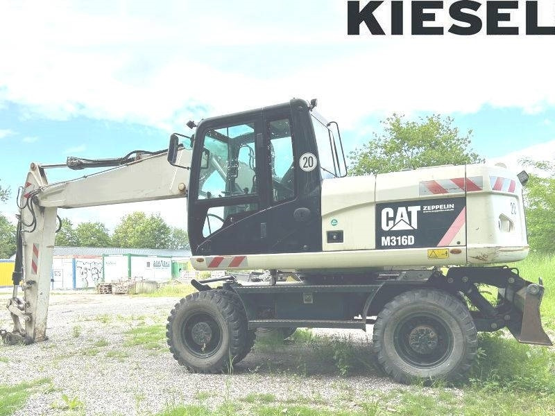 CAT M 316 D - Ratastel ekskavaator: pilt 1 CAT M 316 D - Ratastel ekskavaator: pilt 1