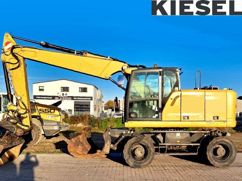 CAT M 318 F - Ratastel ekskavaator: pilt 1 CAT M 318 F - Ratastel ekskavaator: pilt 1