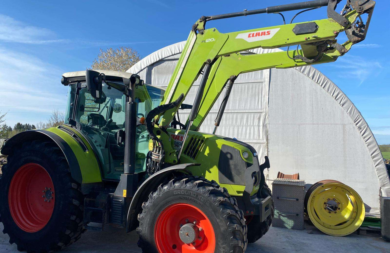 Claas Arion 440 su Claaas front.kr. - Traktor: pilt 1 Claas Arion 440 su Claaas front.kr. - Traktor: pilt 1