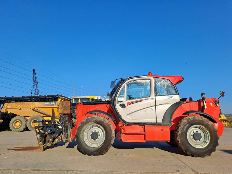 Manitou MT1440E - Teleskooplaadur: pilt 1 Manitou MT1440E - Teleskooplaadur: pilt 1