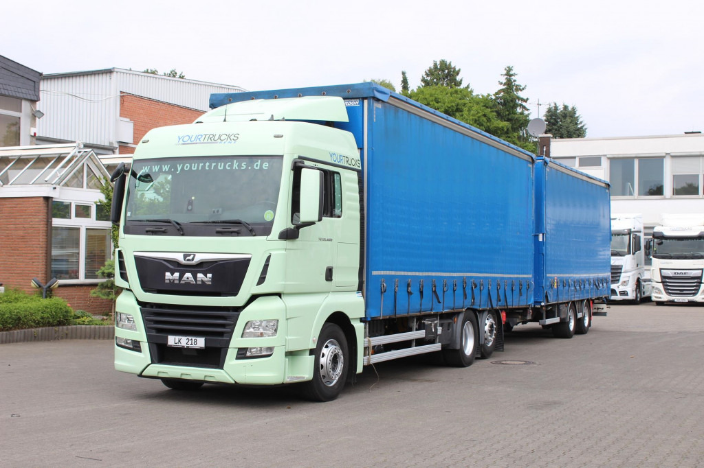 MAN TGX 26.460 Retarder Jumbo-Zug 120M3 Durchlade - Tent veoauto: pilt 1 MAN TGX 26.460 Retarder Jumbo-Zug 120M3 Durchlade - Tent veoauto: pilt 1